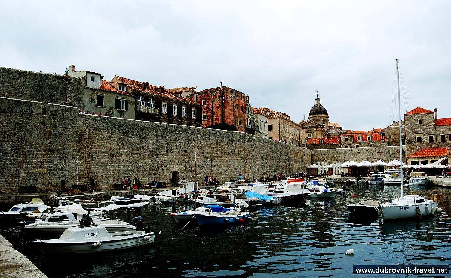 Small boats in the Old Port of Dubrovnik