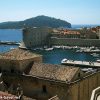 Views from Dubrovnik town walls over to old harbour, Sveti Ivan fortress and Lokrum Island